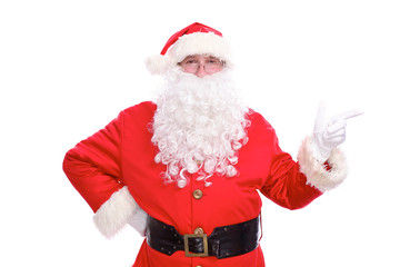 Kind Santa Claus pointing in white blank sign, isolated on white background