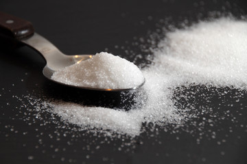 Close-up of granulated sugar in spoon