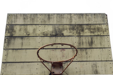The old hoop and stained board for basketball - outdoors