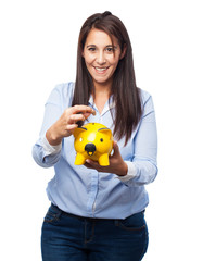 happy young-woman with piggy-bank