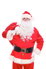 Kind Santa Claus carrying big bag, isolated on white background