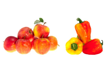 Red ripe apples and sweet pepper on a white background
