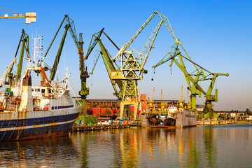 Ships moored at the quay in shipyard of Gdansk, Poland.