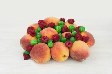 Assortment of juicy fruits, on wooden background