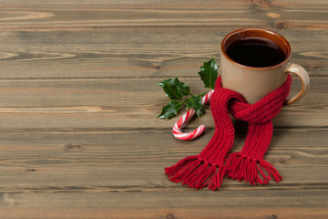 Mug Of Hot Tea Or Coffee With Scarf. Christmas Decorations. Spac