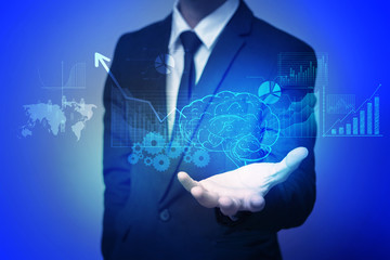 Close up of human hand holding brain