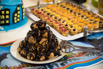 Delicious profiterole chocolate cake