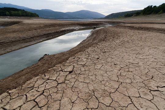 Arid Times - After a long period without rain a river Cetina in Croatia) and it's lake are dry, ground