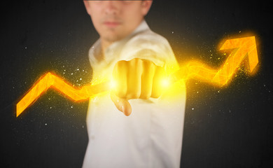 Business person holding a hot glowing upright arrow