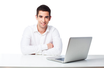 man with laptop on table