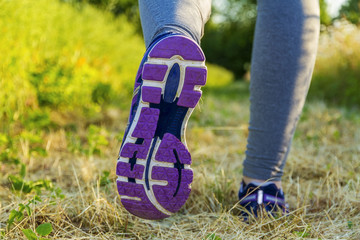 Woman running in a field