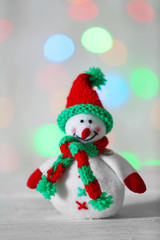 Cute snowmen on Christmas background