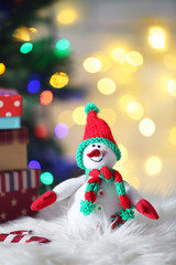 Cute snowman on Christmas background
