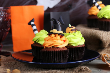 Halloween cupcakes on plate on the table