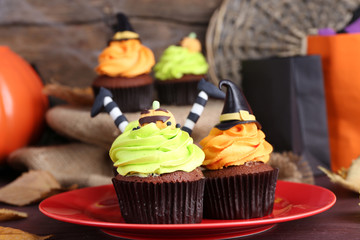 Halloween cupcakes on plate on the table