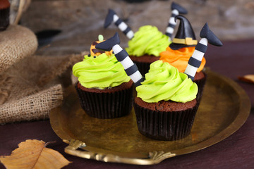 Halloween cupcakes on metal tray on the table