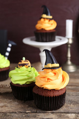 Halloween cupcakes on wooden table