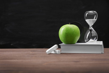 School equipment on blackboard background