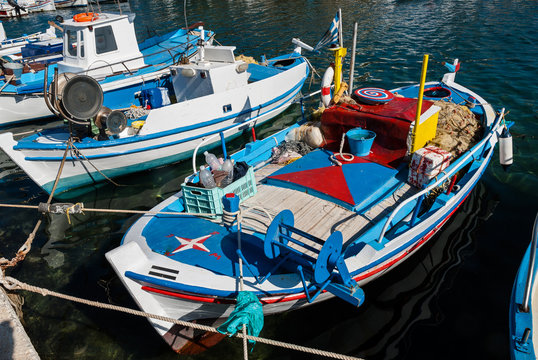 Traditional wooden fishing boats in the harbor of Prophet Elias village in Peloponnese, Greece
