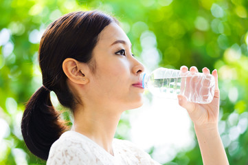 Asian young girl drink water