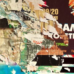 Old Billboard With Torn  Paper Posters Background and Texture