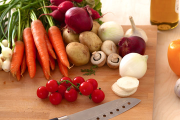 Pile of organic vegetables on a wooden table
