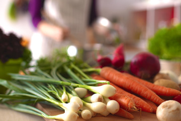 Pile of organic vegetables on a wooden table