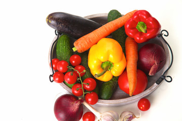 Fresh autumn vegetables on a white background