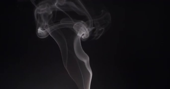 white thin smoke rising through screen