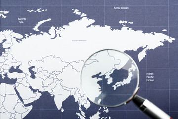 World map with magnifying glass. Worldly cuisine concept
