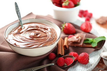 Beautiful composition with chocolate cream and raspberries