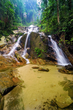 Beautiful cascading waterfall in tropical forest