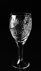 Empty glass on black background