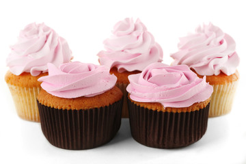 Tasty cupcakes, isolated on white