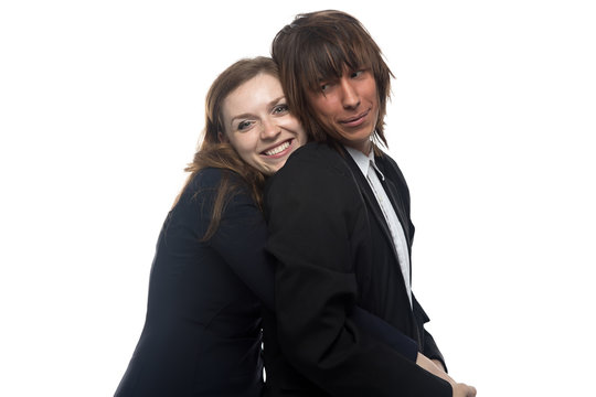 Happy woman and serious man in black jacket