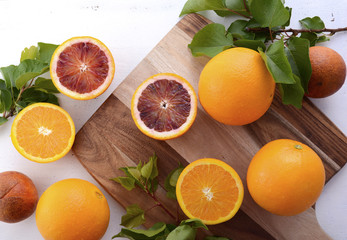 Mixed Oranges on Chopping Board
