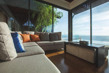 Luxury living room interior with shadow and seascape view