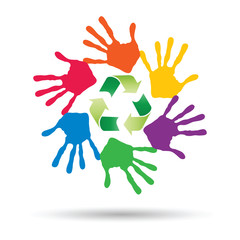 Conceptual circle or spiral made of painted human hands with green recycle symbol