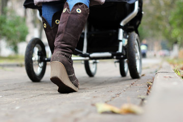 Fototapeta na wymiar foot steps with stroller