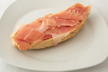 slice of bread with jamon serrano Spanish