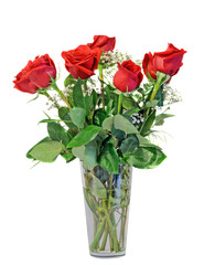 Red rose flowers in a transparent vase, green leaves, close up, white background, isolated.