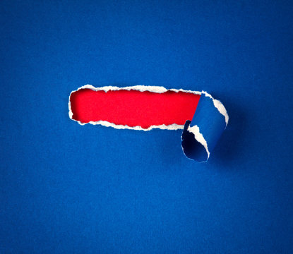 Torn blue Paper and space for text with red paper background