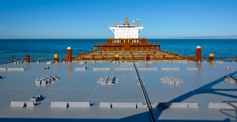 Empty deck of container ship © Igor Groshev