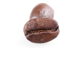 roasted coffee beans isolated on white background.