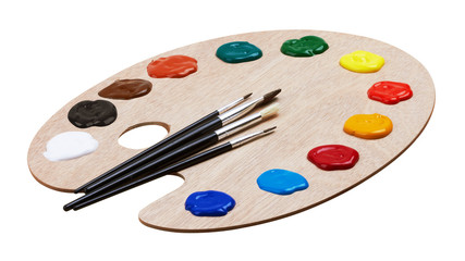 Wooden art palette with paints and brushes