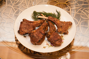 Tasty ribs on the plate