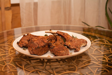 Tasty ribs on the plate