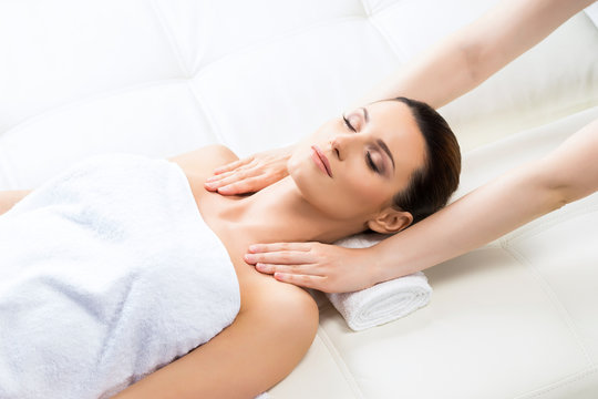 Attractive woman in spa having massage.
