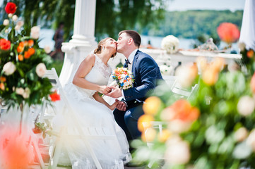 happy fashionable wedding couple on wedding ceremony of registra