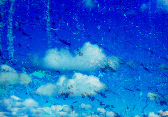 grunge image of blue sky with clouds